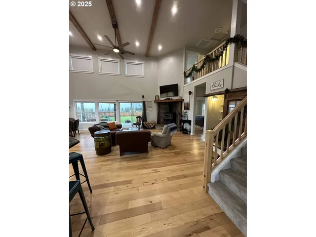 a living room with furniture and a rug