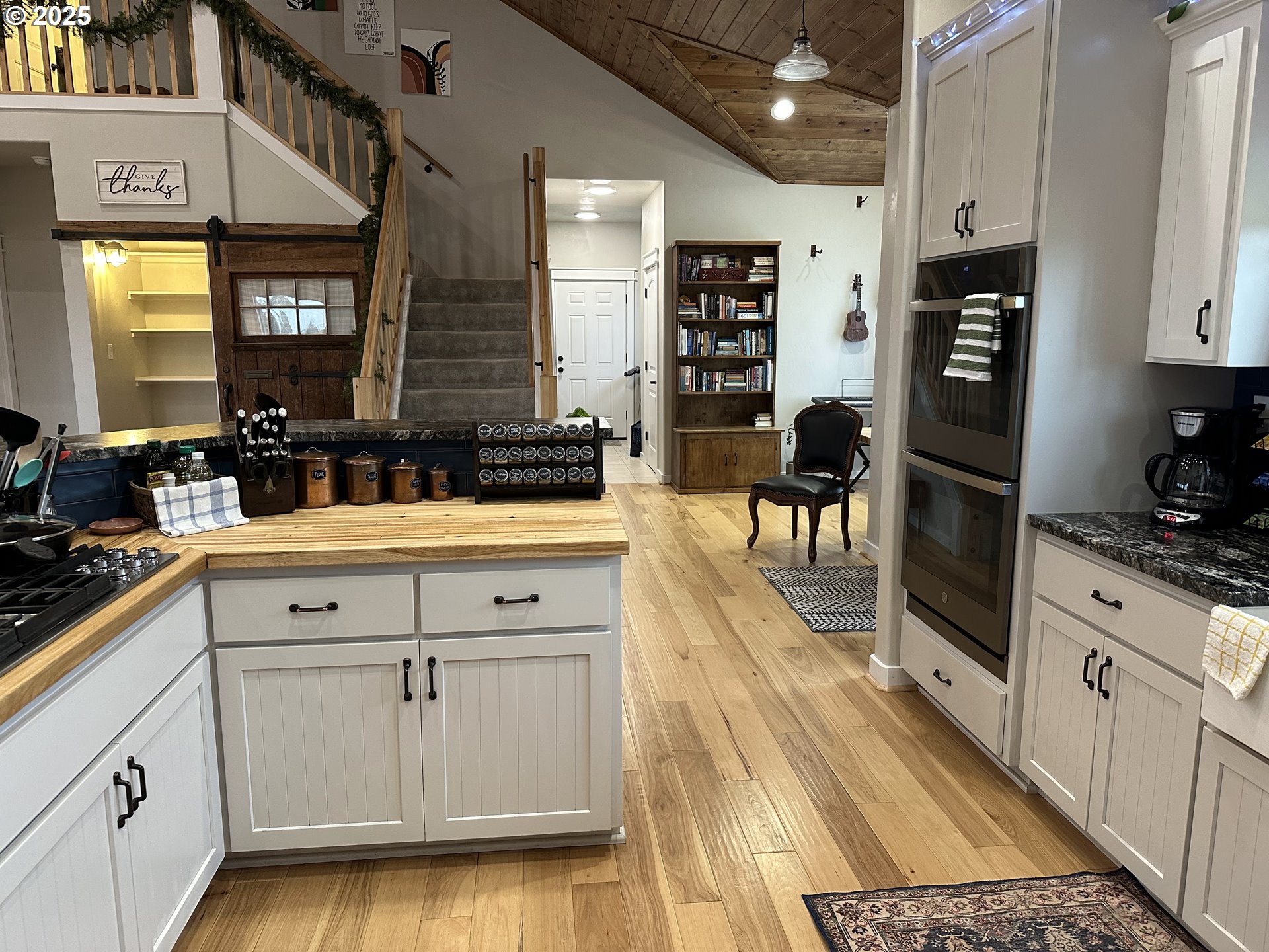 34786 Pleasant View Road Chiloquin, OR 97624 - Photo 10 of 48 a kitchen with stainless steel appliances granite countertop a sink and cabinets
