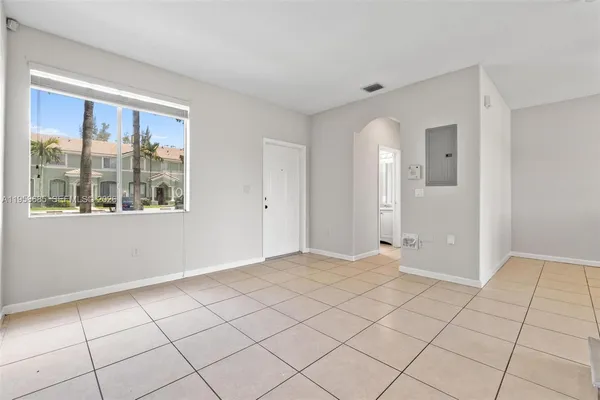 a view of an empty room with window