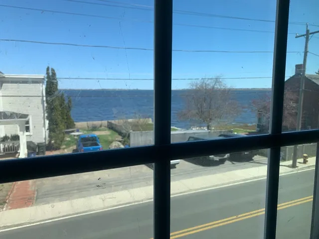 a view of a glass door with a view of the window