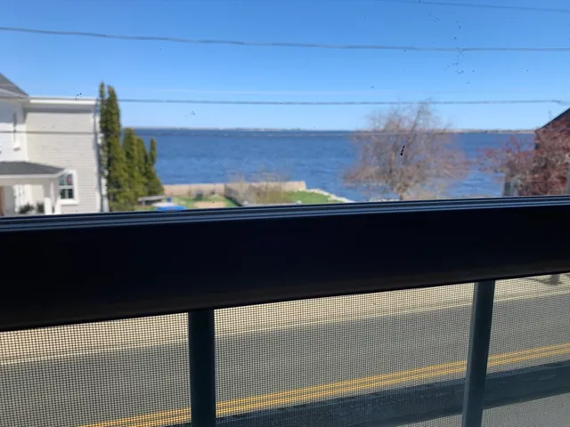 a closeup of a sink with wooden floor