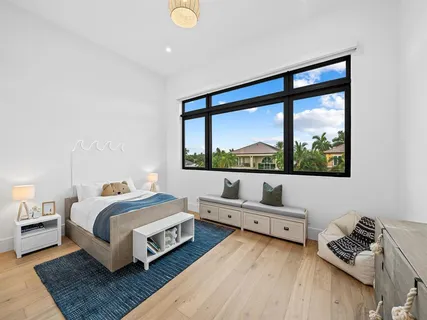 a room with a bed and a window