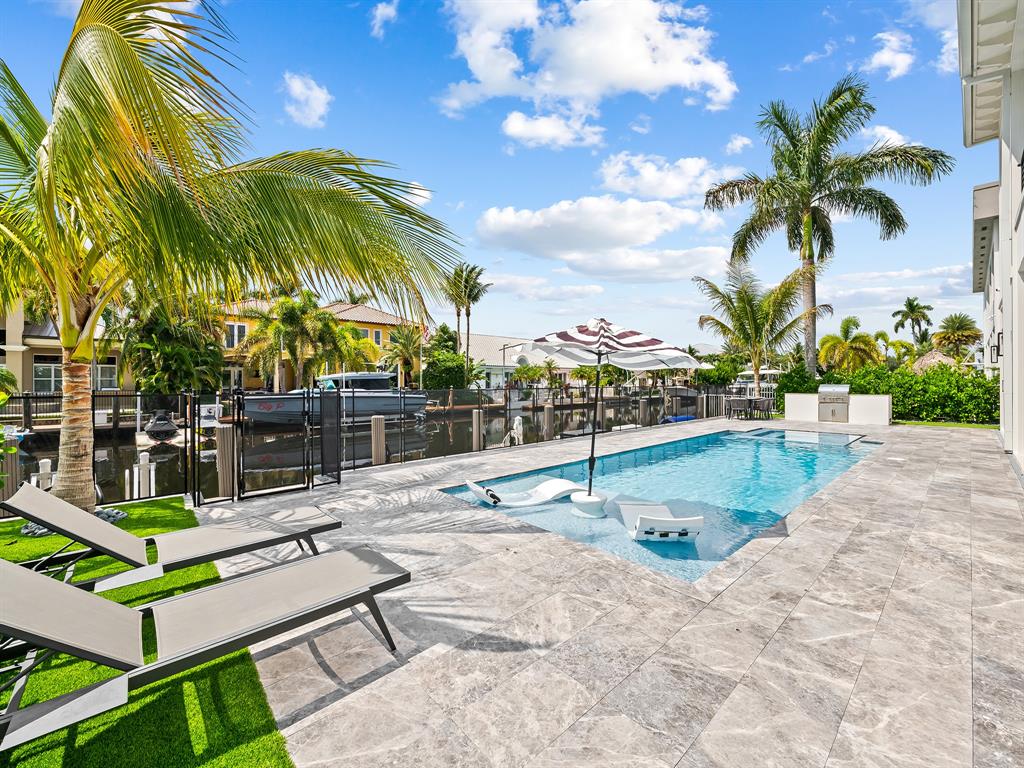 2420 Northeast 48th Street Lighthouse Point, FL 33064 - Photo 45 of 51 a view of outdoor space with seating