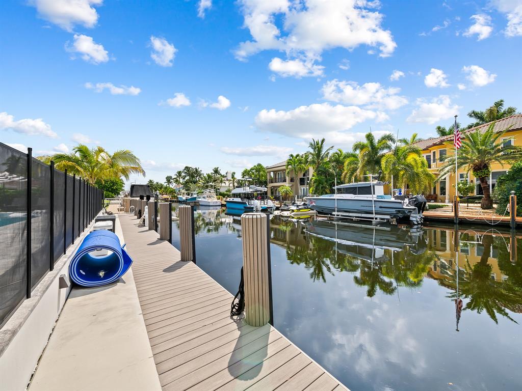 2420 Northeast 48th Street Lighthouse Point, FL 33064 - Photo 47 of 51 a view of a lake with houses