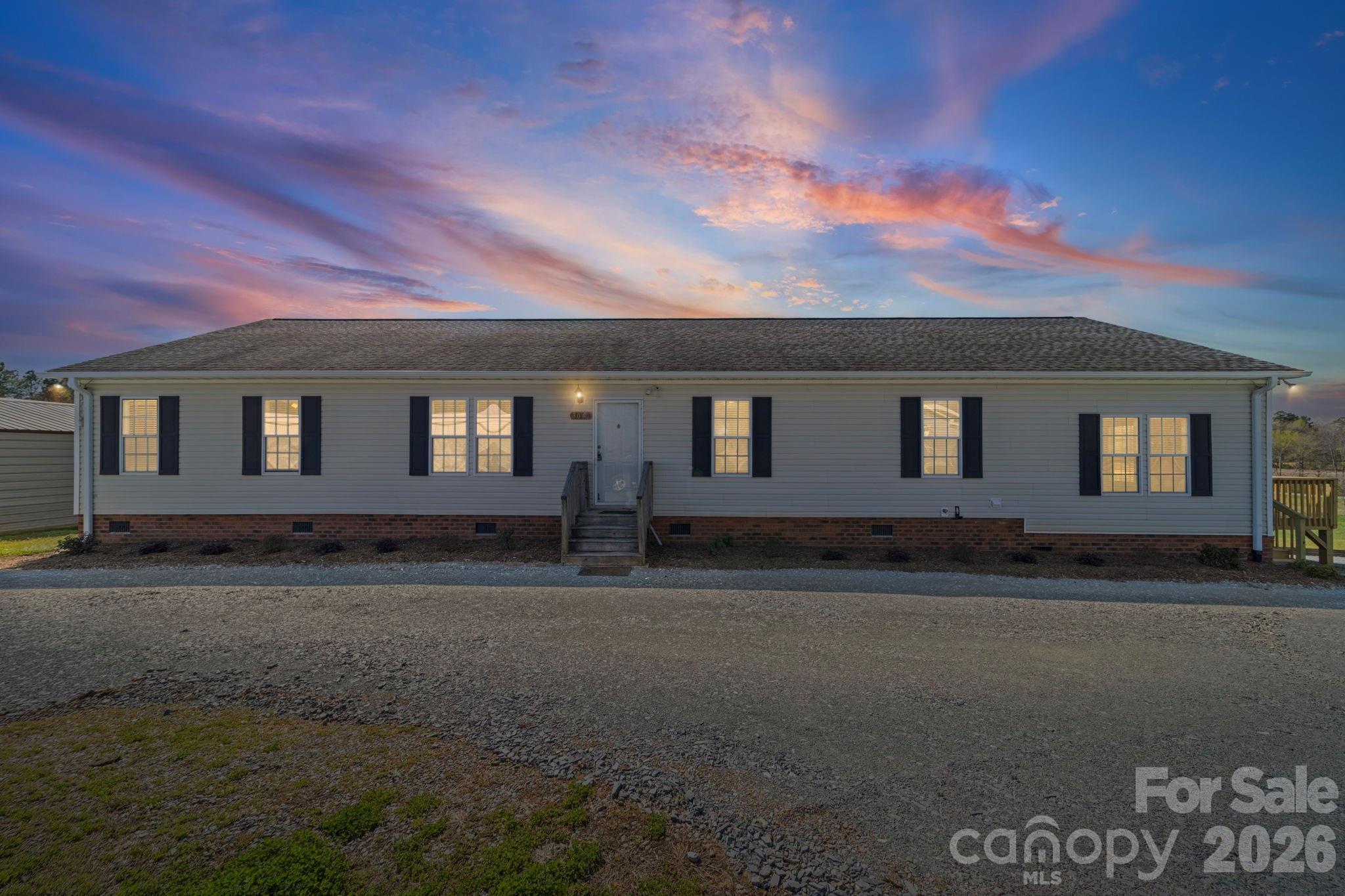 3010 Old Monroe Marshville Road Wingate, NC 28174 - Photo 1 of 44 a house view with a backyard space