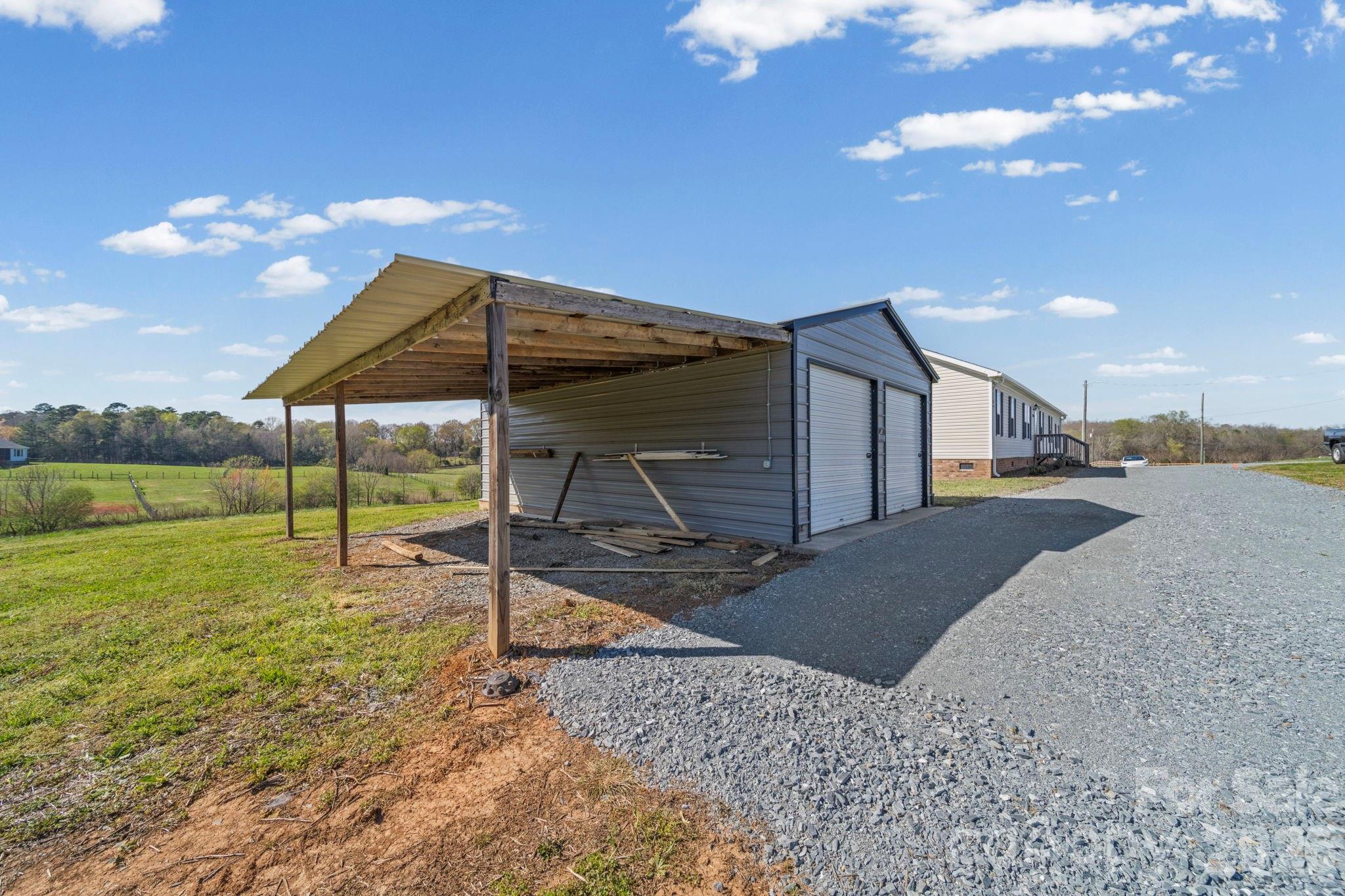 3010 Old Monroe Marshville Road Wingate, NC 28174 - Photo 39 of 44 a house view with a outdoor space