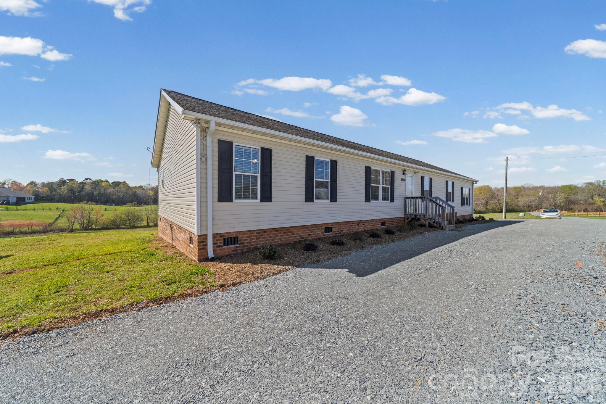 3010 Old Monroe Marshville Road Wingate, NC 28174 - Photo 40 of 44 a view of a house with backyard and ocean view