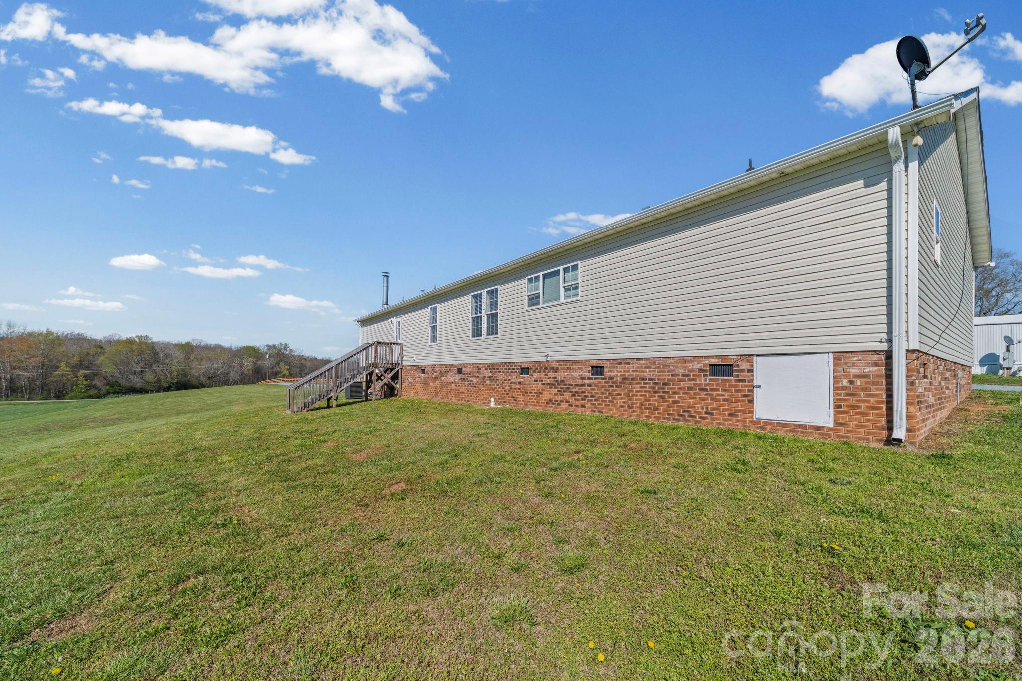 3010 Old Monroe Marshville Road Wingate, NC 28174 - Photo 43 of 44 a view of a backyard of the house