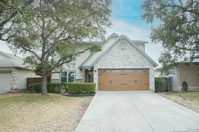 a view of backyard of garage