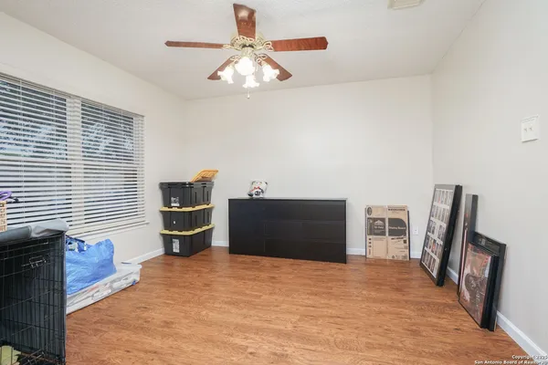 a bedroom with a bed and furniture