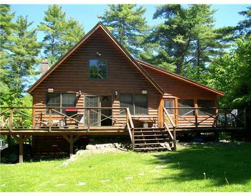 210 Dunton Road Naples, ME 04055 - Photo 2 of 17 Exterior Front. Screened porch & Deck