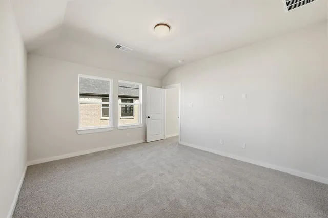 a bathroom with bathtub and window