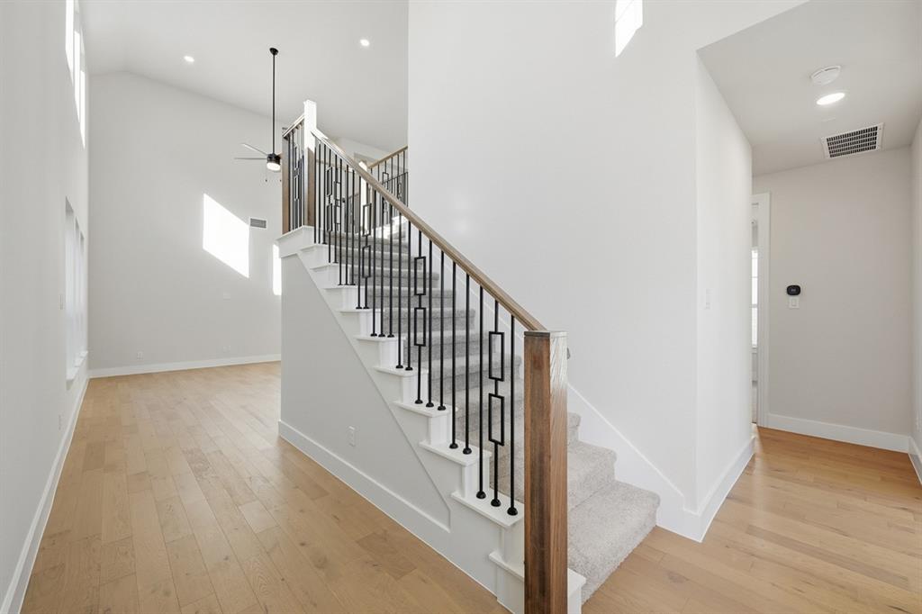 4409 Script Street Prosper, TX 75078 - Photo 18 of 24 a view of entryway and hall with wooden floor