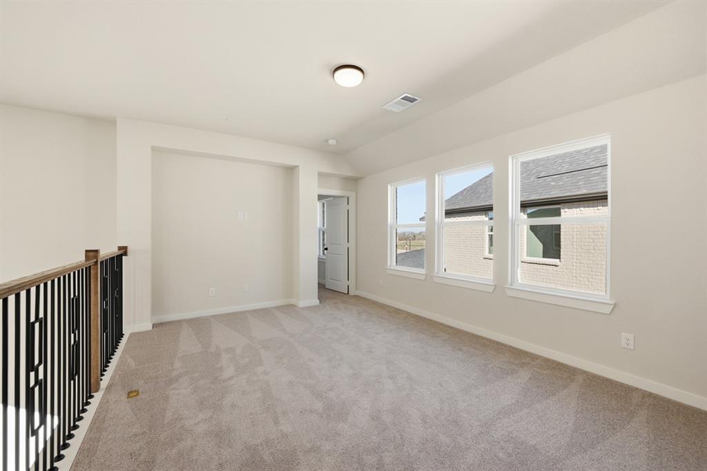 4409 Script Street Prosper, TX 75078 - Photo 23 of 24 a view of an empty room with a window