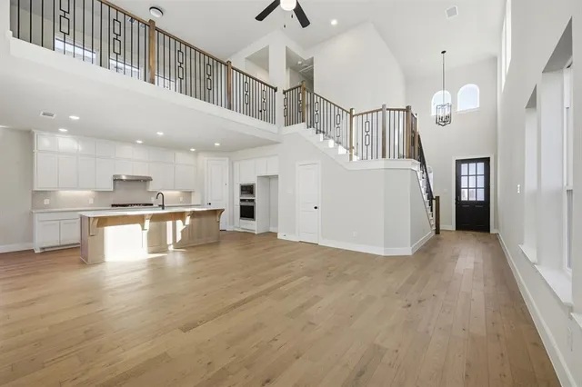 a view of an empty room with stairs
