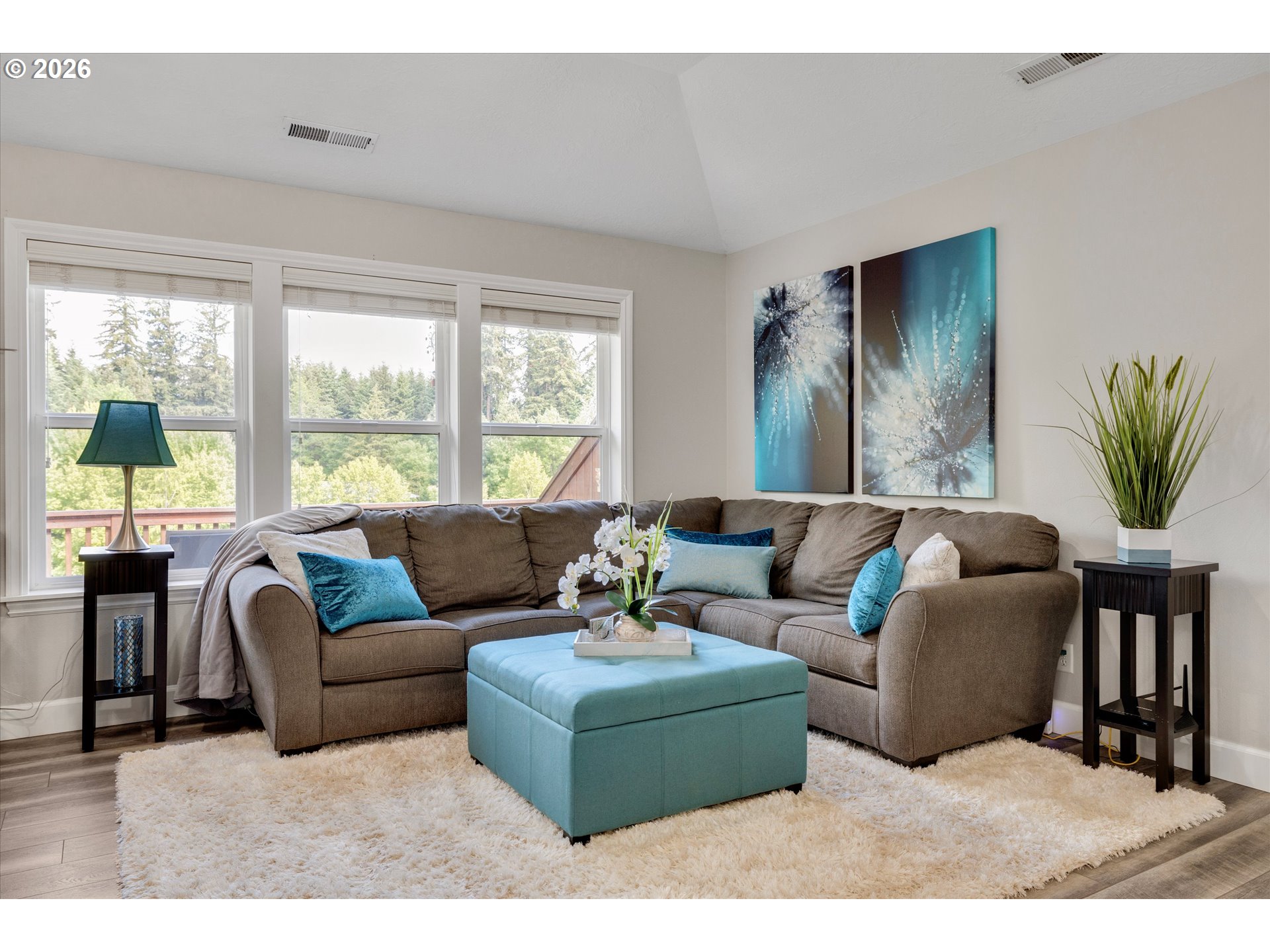 3769 10th Street Hubbard, OR 97032 - Photo 19 of 47 a living room with furniture and a large window