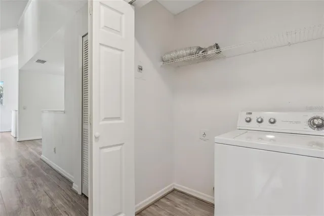 a view of a storage & utility room with washer and dryer