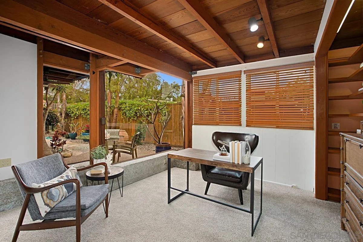 6243 Dowling Drive La Jolla, CA 92037 - Photo 20 of 28 a living room with furniture and a window