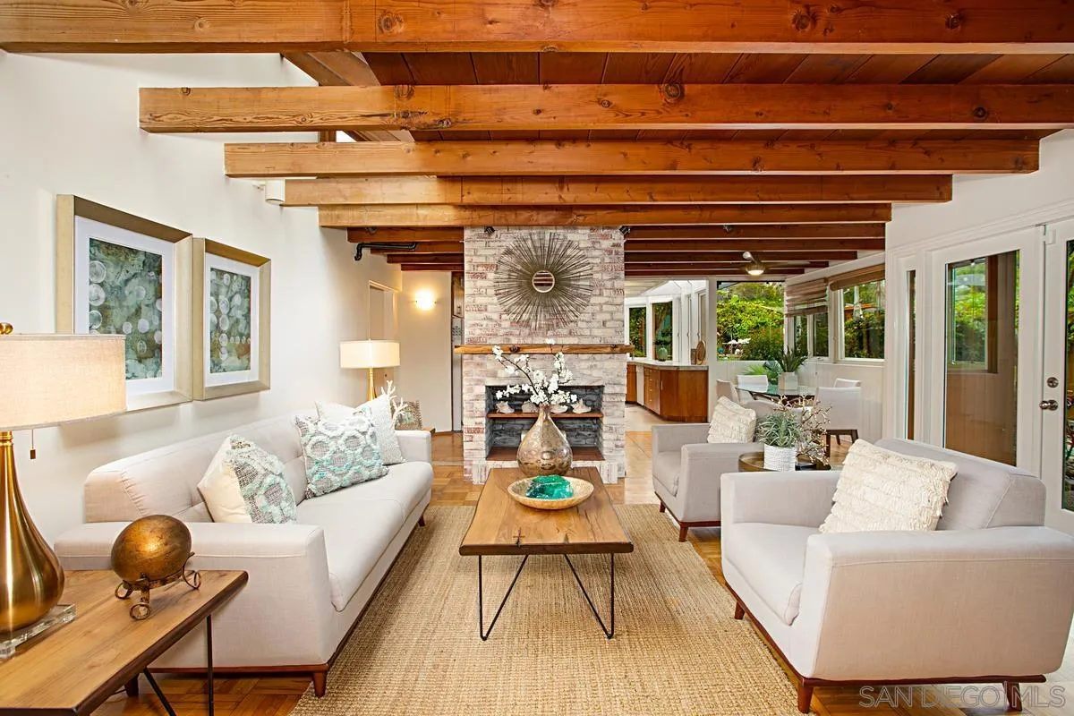 6243 Dowling Drive La Jolla, CA 92037 - Photo 5 of 28 a living room with furniture and a potted plant