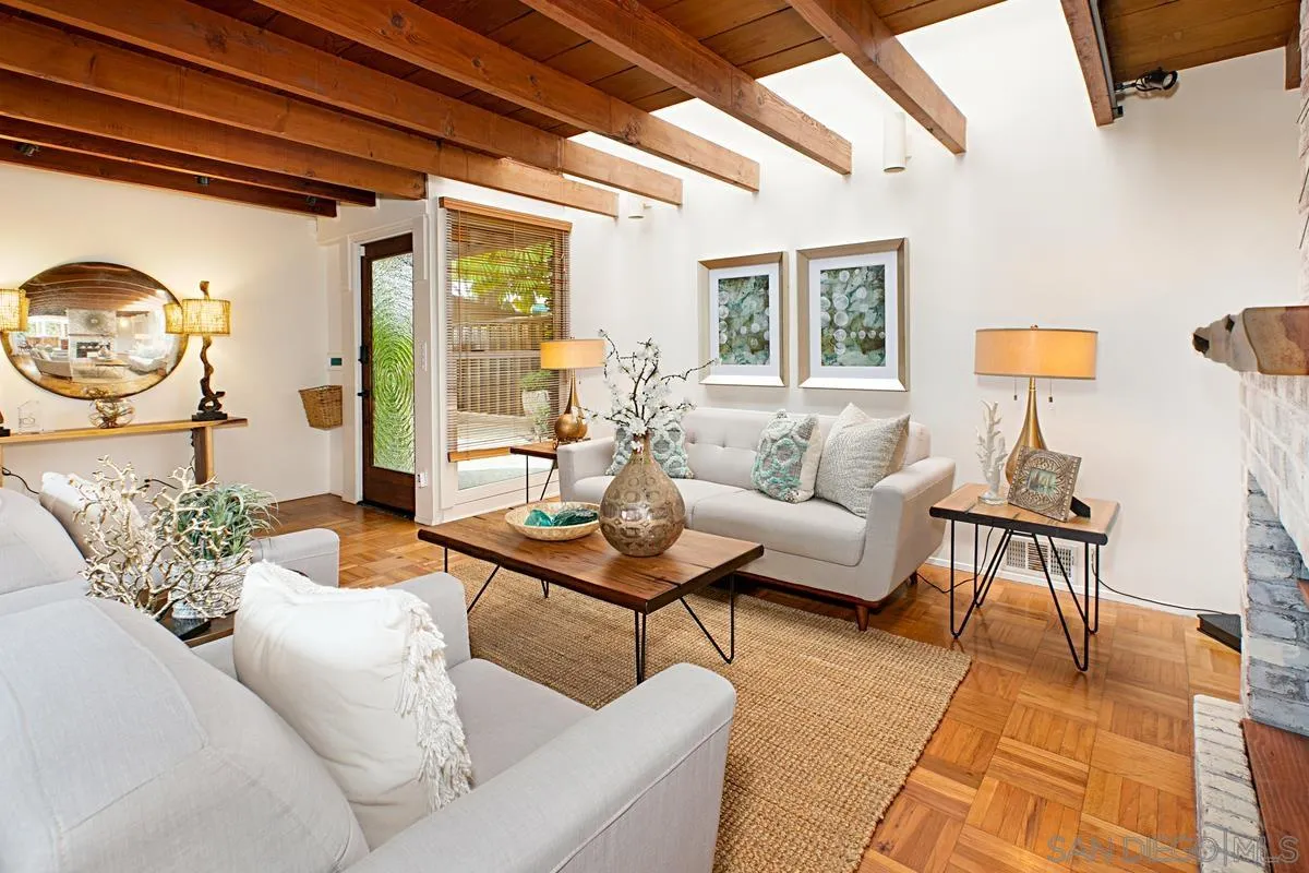 6243 Dowling Drive La Jolla, CA 92037 - Photo 7 of 28 a living room with furniture and a window