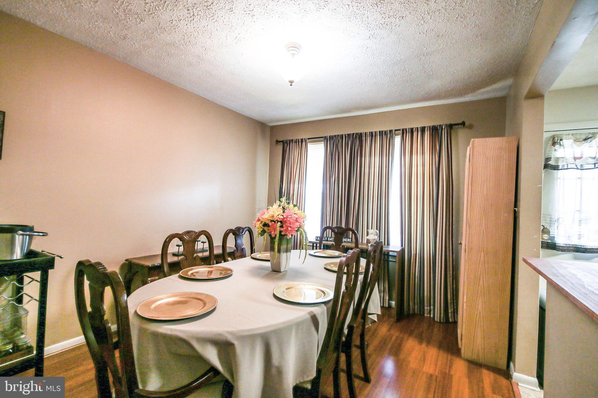 8121 Elizabeth Road Pasadena, MD 21122 - Photo 8 of 28 separate dining room