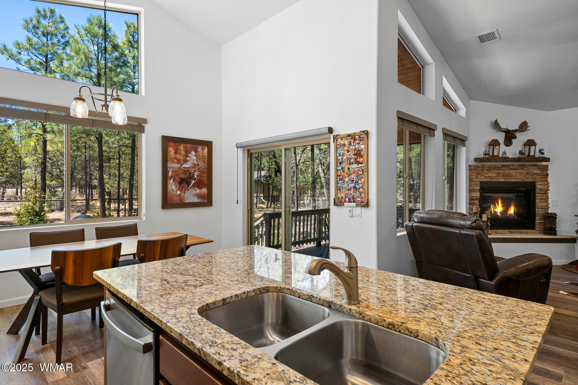 242 Frog Island Road Lakeside, AZ 85929 - Photo 10 of 28 Kitchen island with sink and dishwasher