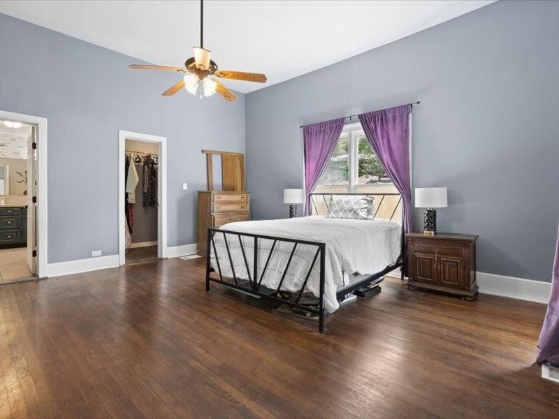 809 East Adams Street Itasca, TX 76055 - Photo 15 of 31 a bedroom with a bed and a window