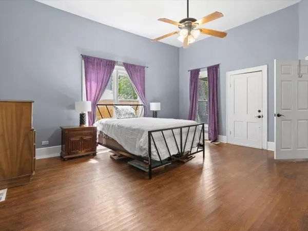 a bed room with a bed and a window