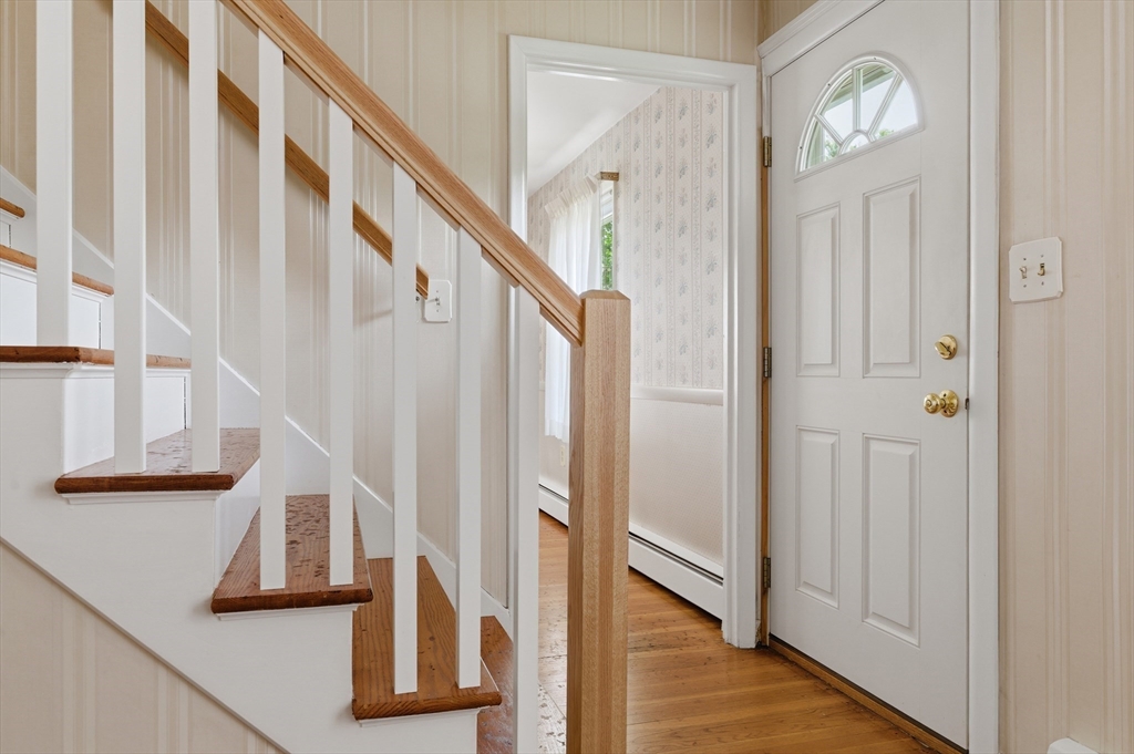 188 Glendale Road Attleboro, MA 02703 - Photo 15 of 37 a view of front door with stairs