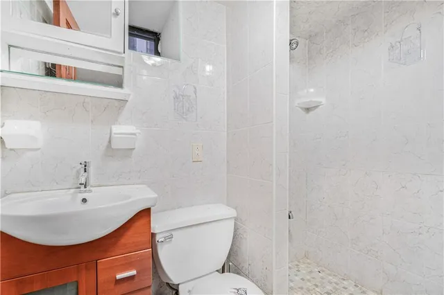 a living room with furniture a rug and a window