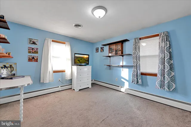 a view of kitchen and workspace