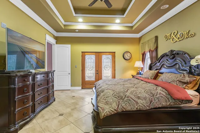 a bedroom with a bed and dresser