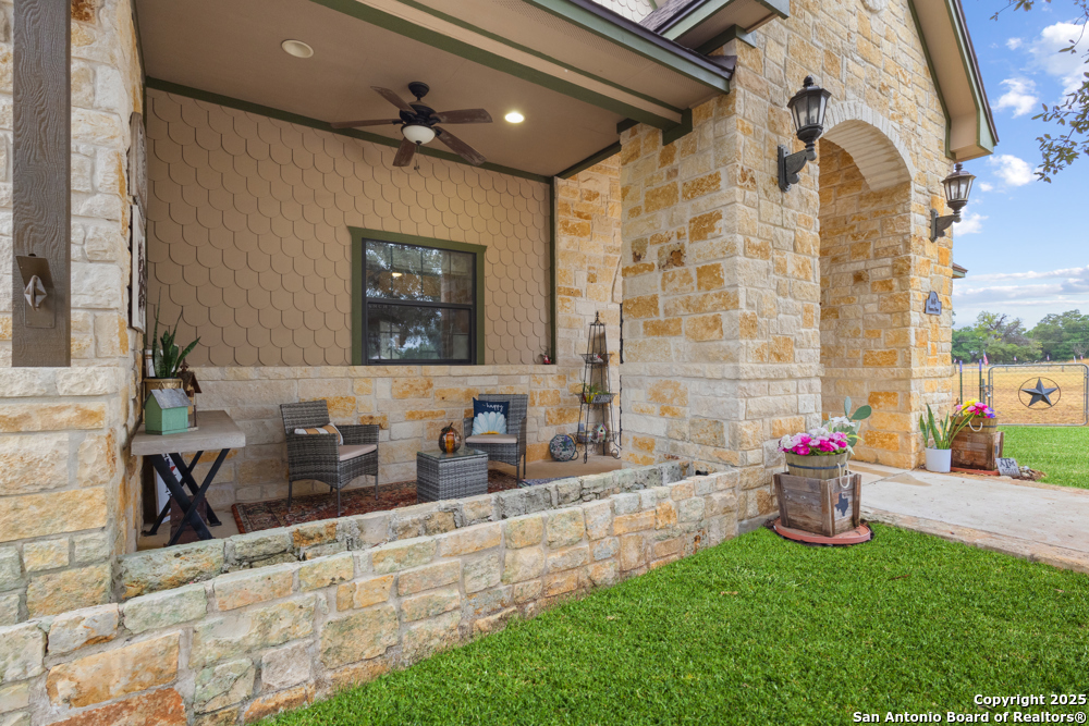 168 Bandera Boulevard Bandera, TX 78003 - Photo 2 of 39 a bathroom with a sink mirror and tub