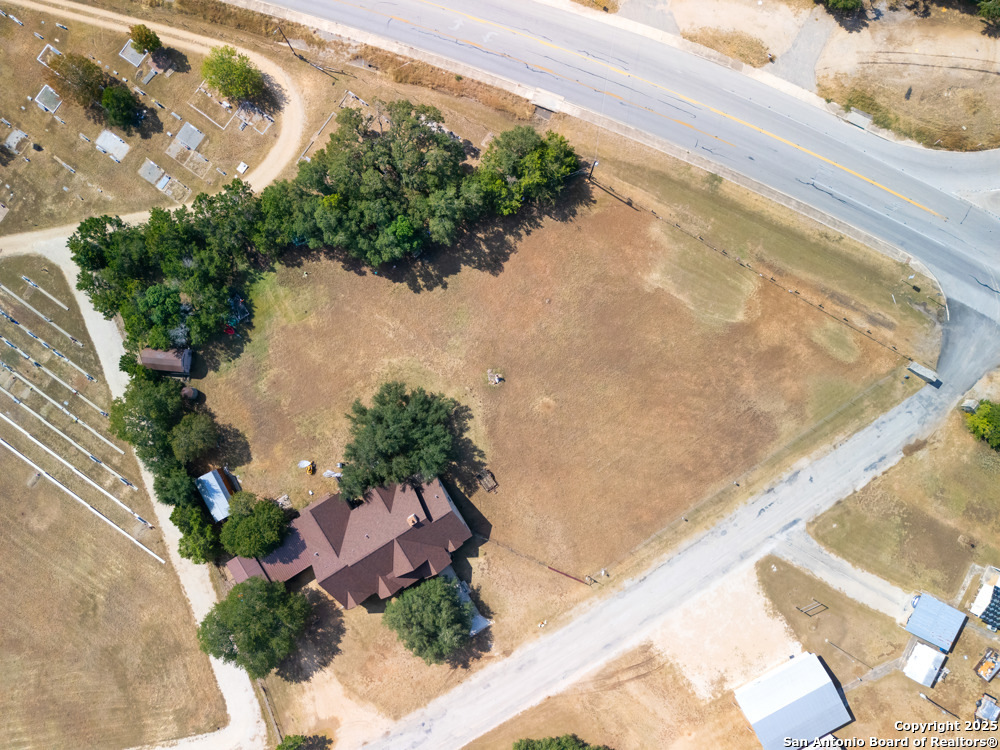 168 Bandera Boulevard Bandera, TX 78003 - Photo 32 of 39 a view of a backyard