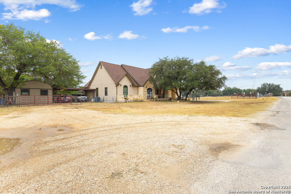 168 Bandera Boulevard Bandera, TX 78003 - Photo 36 of 39 a view of swimming pool with an outdoor space and seating area