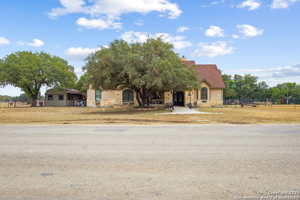 168 Bandera Boulevard Bandera, TX 78003 - Photo 39 of 39 a swimming pool with outdoor seating and yard