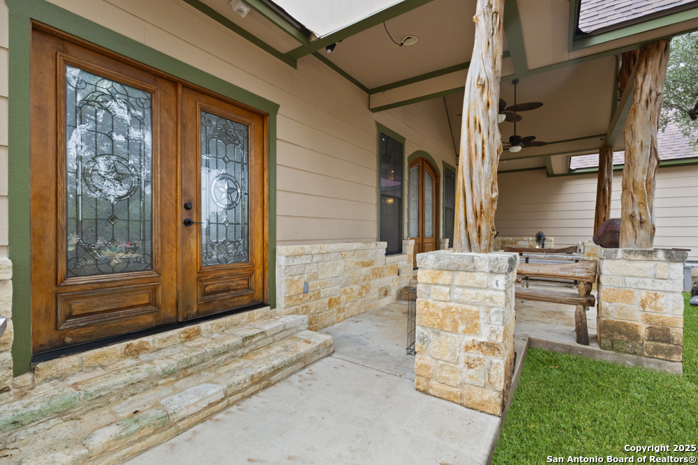 168 Bandera Boulevard Bandera, TX 78003 - Photo 4 of 39 a view of front door of house