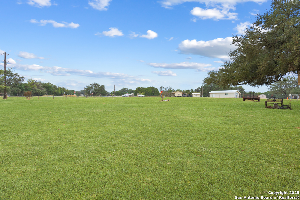 168 Bandera Boulevard Bandera, TX 78003 - Photo 6 of 39 a view of an ocean and a yard