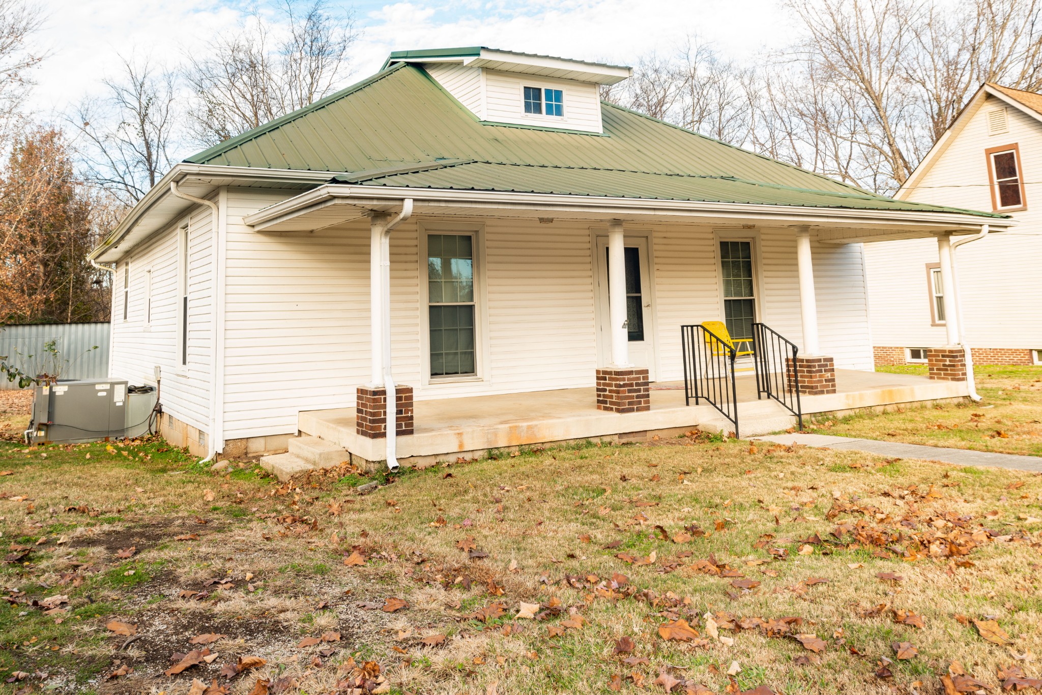 101 Maple Street Normandy, TN 37360 - Photo 2 of 21 a front view of a house with a yard