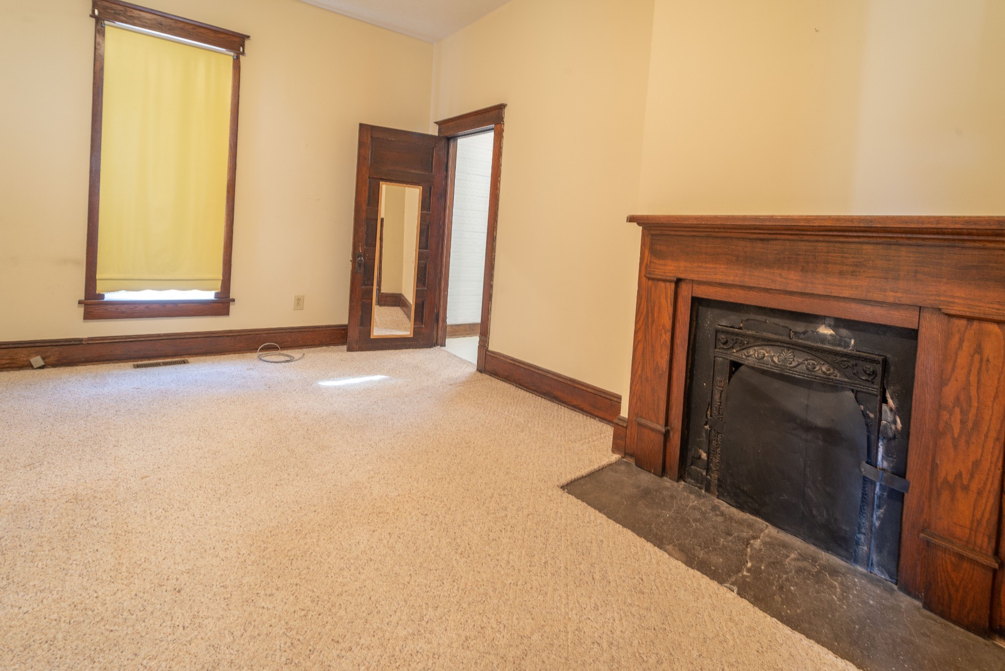 101 Maple Street Normandy, TN 37360 - Photo 12 of 21 a view of an empty room with a fireplace and a window