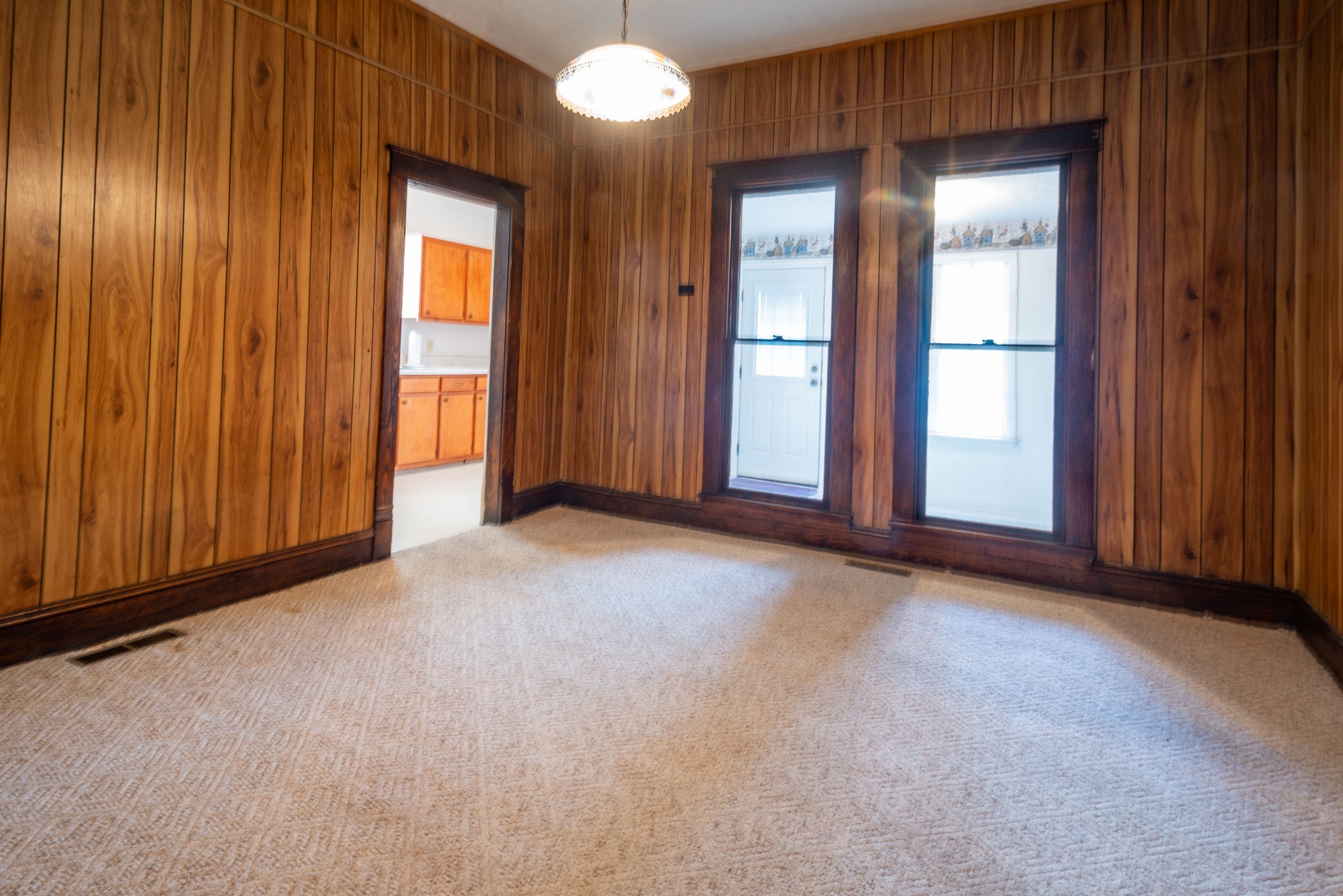 101 Maple Street Normandy, TN 37360 - Photo 16 of 21 an empty room with windows and wooden door