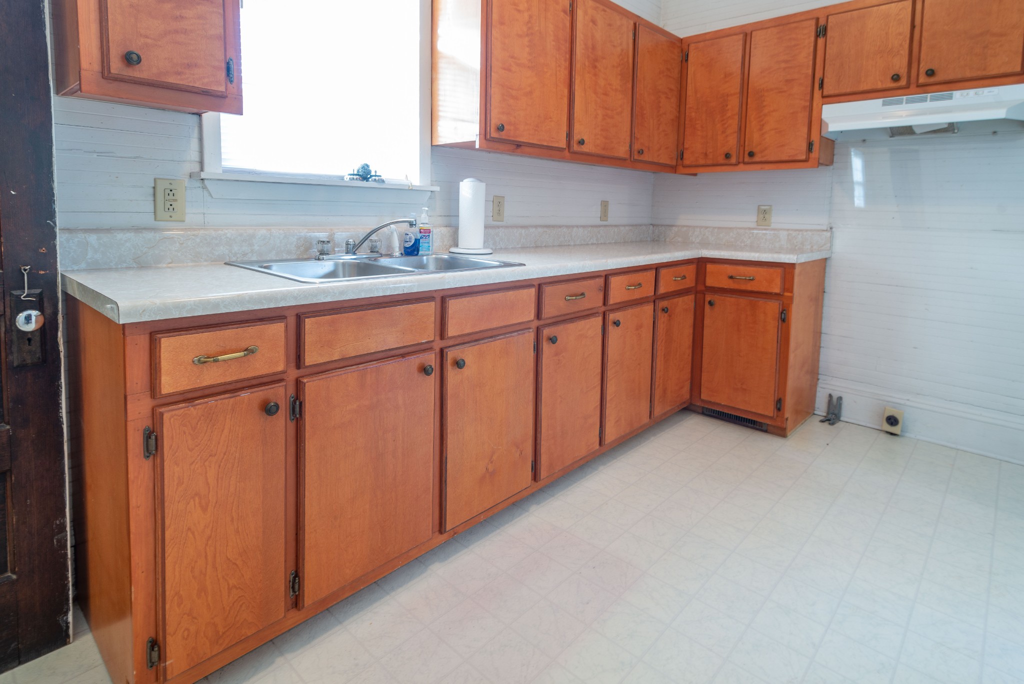 101 Maple Street Normandy, TN 37360 - Photo 17 of 21 a kitchen with stainless steel appliances granite countertop wooden cabinets a sink and dishwasher