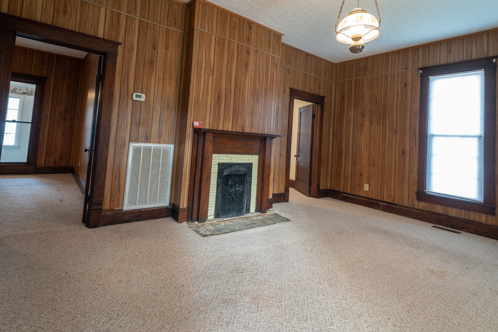 101 Maple Street Normandy, TN 37360 - Photo 21 of 21 an empty room with windows and fireplace