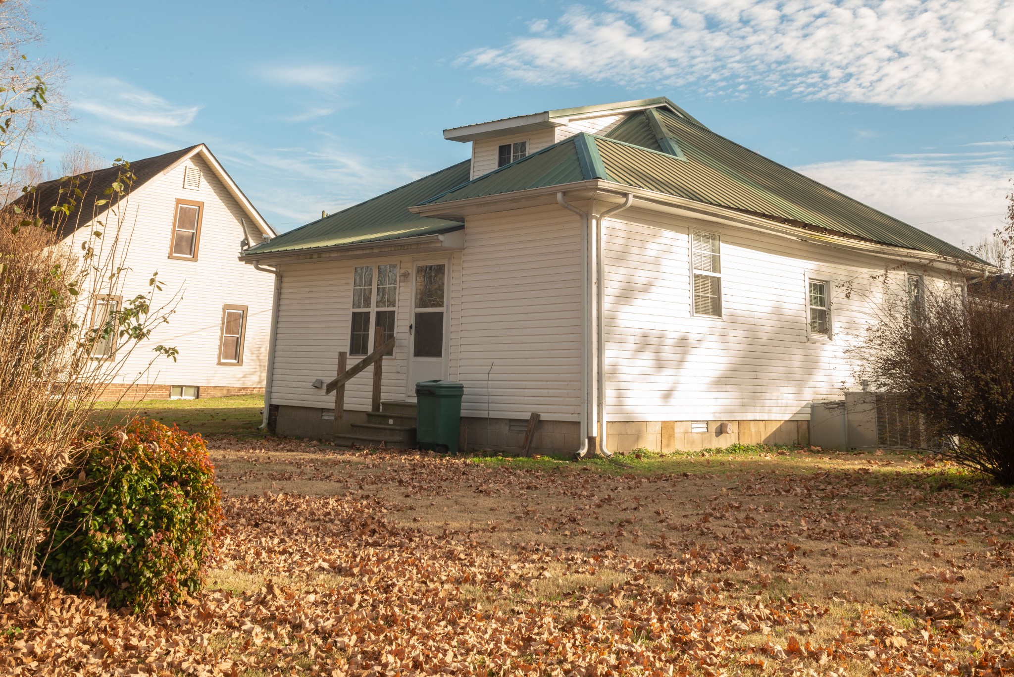 101 Maple Street Normandy, TN 37360 - Photo 4 of 21 a front view of a house with a yard