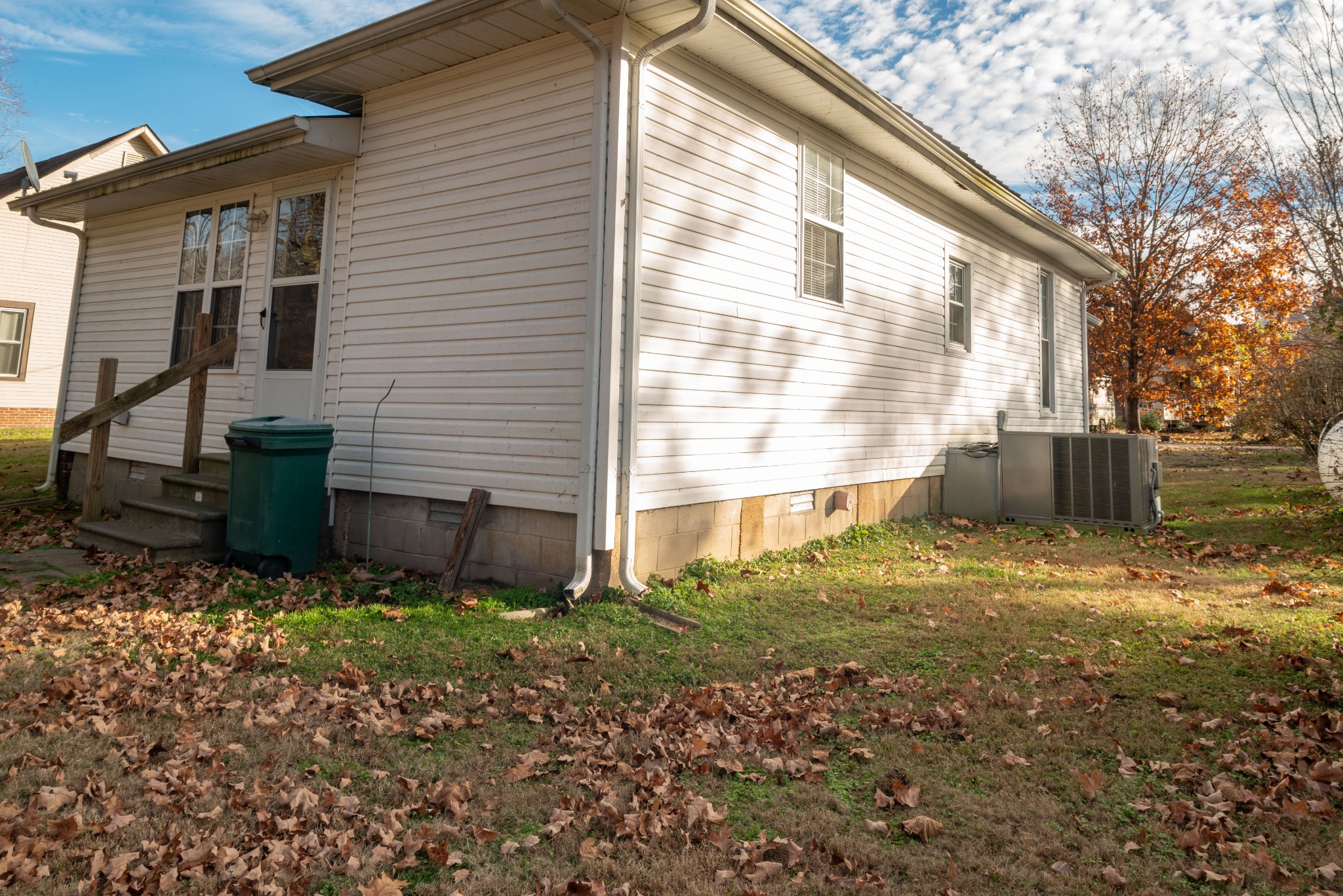 101 Maple Street Normandy, TN 37360 - Photo 5 of 21 a view of a backyard with plants and large tree