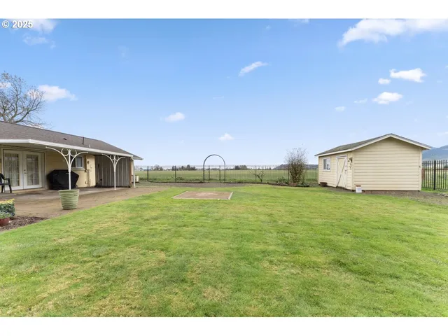 a house view with a garden space