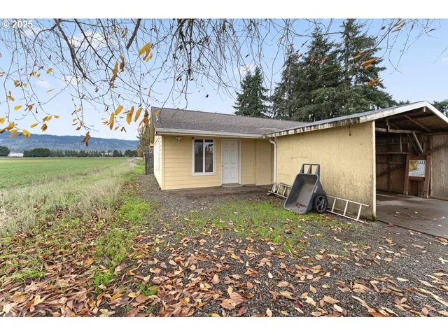 a house view with a backyard space