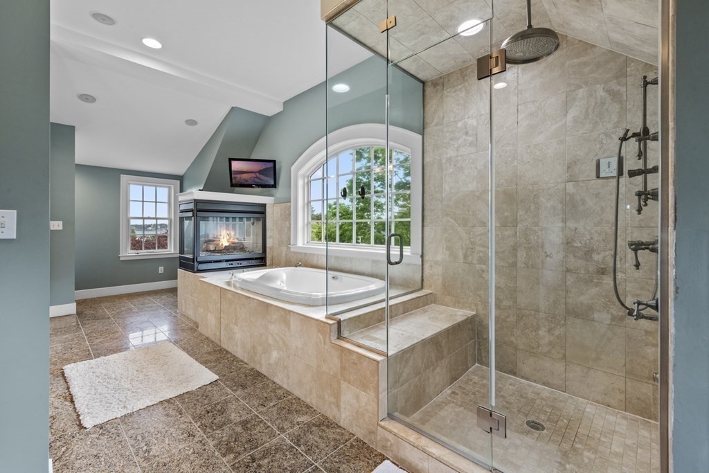 49 Harbor Avenue Marblehead, MA 01945 - Photo 35 of 42 a very nice looking room with a large window and a fireplace