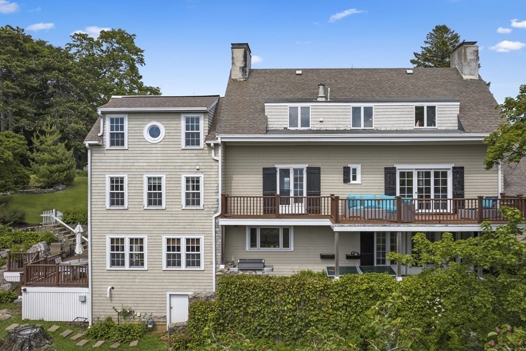49 Harbor Avenue Marblehead, MA 01945 - Photo 5 of 42 a front view of residential houses with a yard