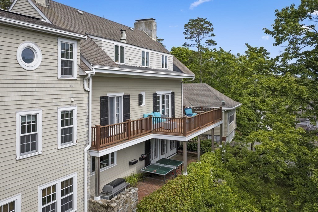 49 Harbor Avenue Marblehead, MA 01945 - Photo 6 of 42 a front view of a house with a yard
